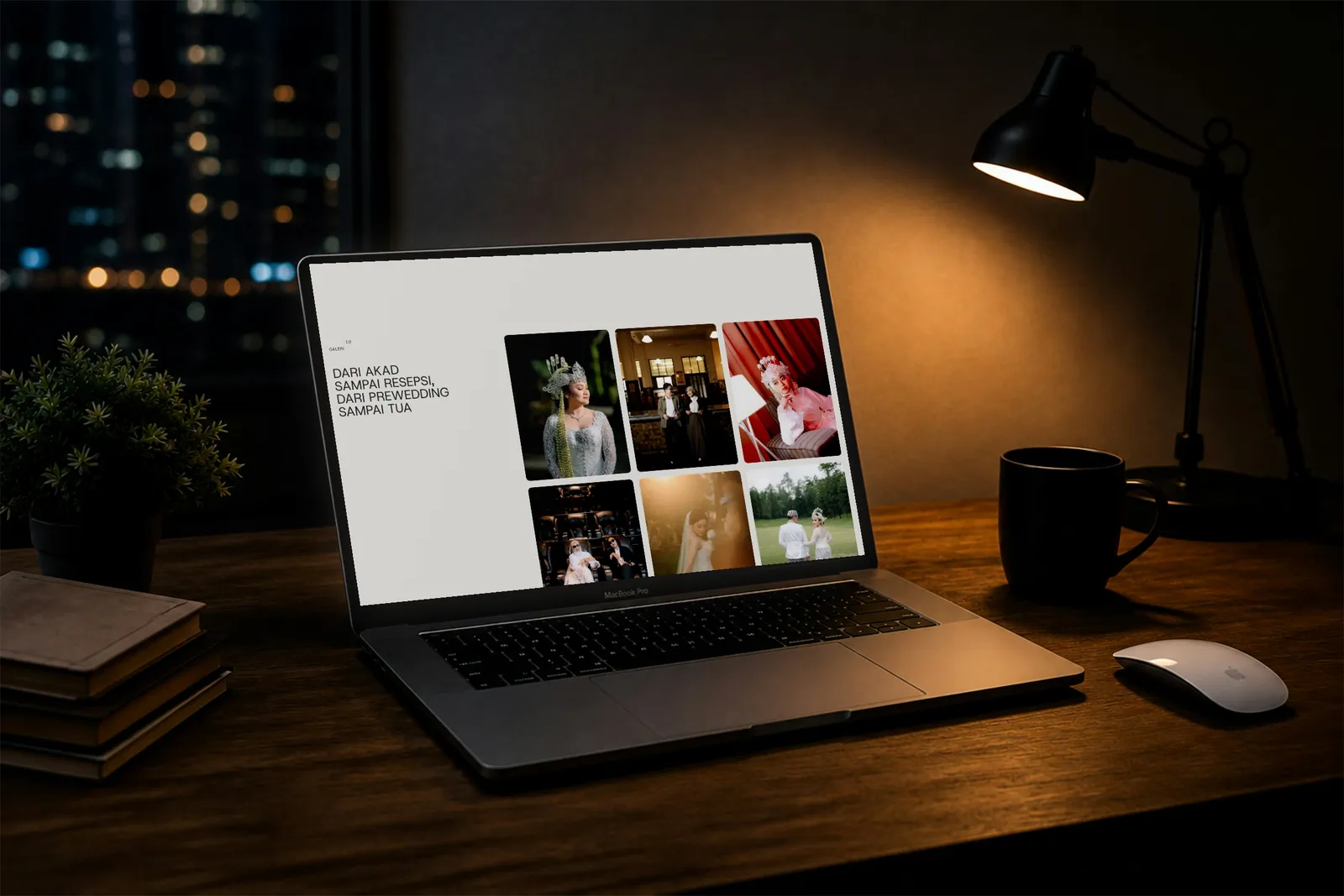 Website JF Visual buatan OmniSite, terbuka di layar laptop di atas meja kerja pada malam hari